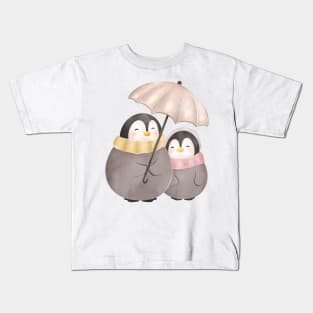 Cute umbrella penguins Kids T-Shirt